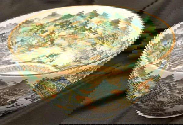 Earthen ware bowl: Rare and unusual 18th/19th(?) century Asian earthenware bowl, decorated with landscape scenes of mountains, streams and pagodas in greens, blues and red with Artist mark on bottom. Height: 7 in. Diame