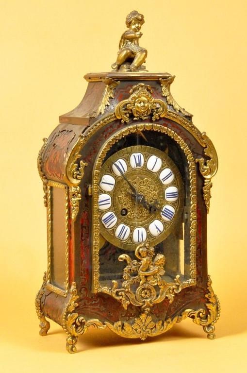 Late 19th C French Boulle style shelf clock : Late 19th C French Boulle style shelf clock with tortoise shell inlay and gilt ormolu trim. Height: 15"