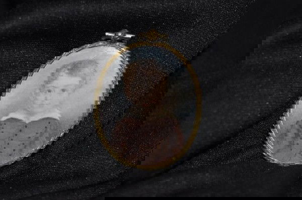 Miniature oval portrait painting on ivory. A young: Miniature oval portrait painting on ivory. A young boy, gilt metal frame 2 1/2" H