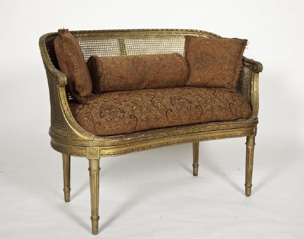 French gilt wood carved gilt wood cane love seat: French gilt wood carved gilt wood cane love seat