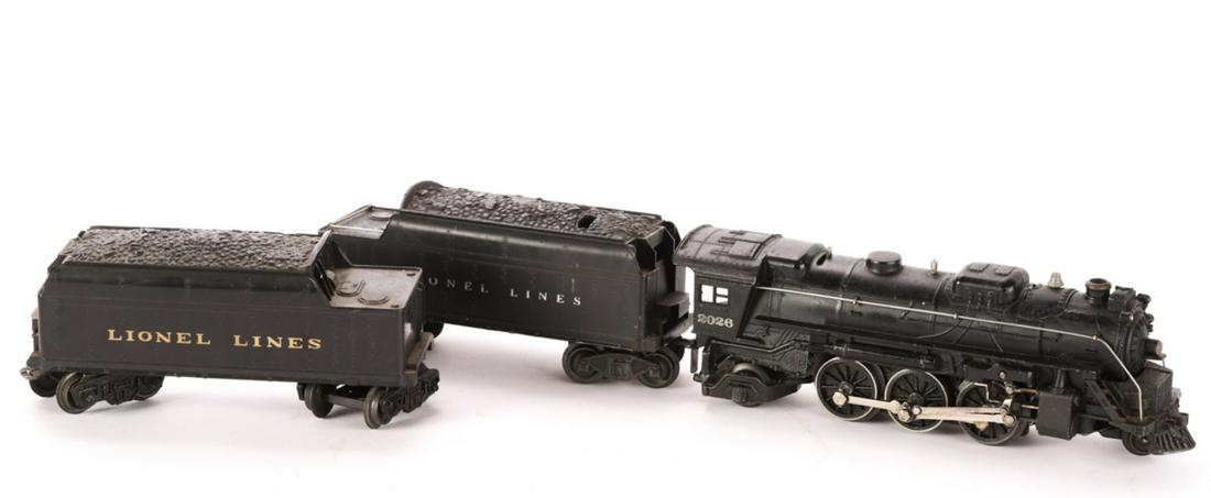 LIONEL LOCOMOTIVE 027 and (2) TENDERS 6466WX: The second tender with larger Lionel letters is not marked. 10 inches (and under)