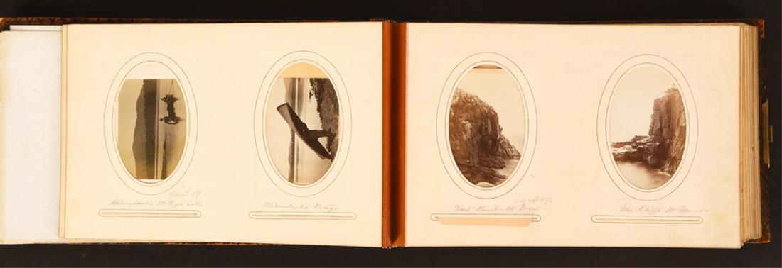 PHOTO ALBUM CONTAINING (96) ANNOTATED CDVs: Including: Mt. Desert 1872, Mount Mansfield Summit House 1873, Newport RI, Egypt Mosque and Village, Collossis, Thebes, Cemetery, Athenes Temples, Parthenon, Roman ruins etc.