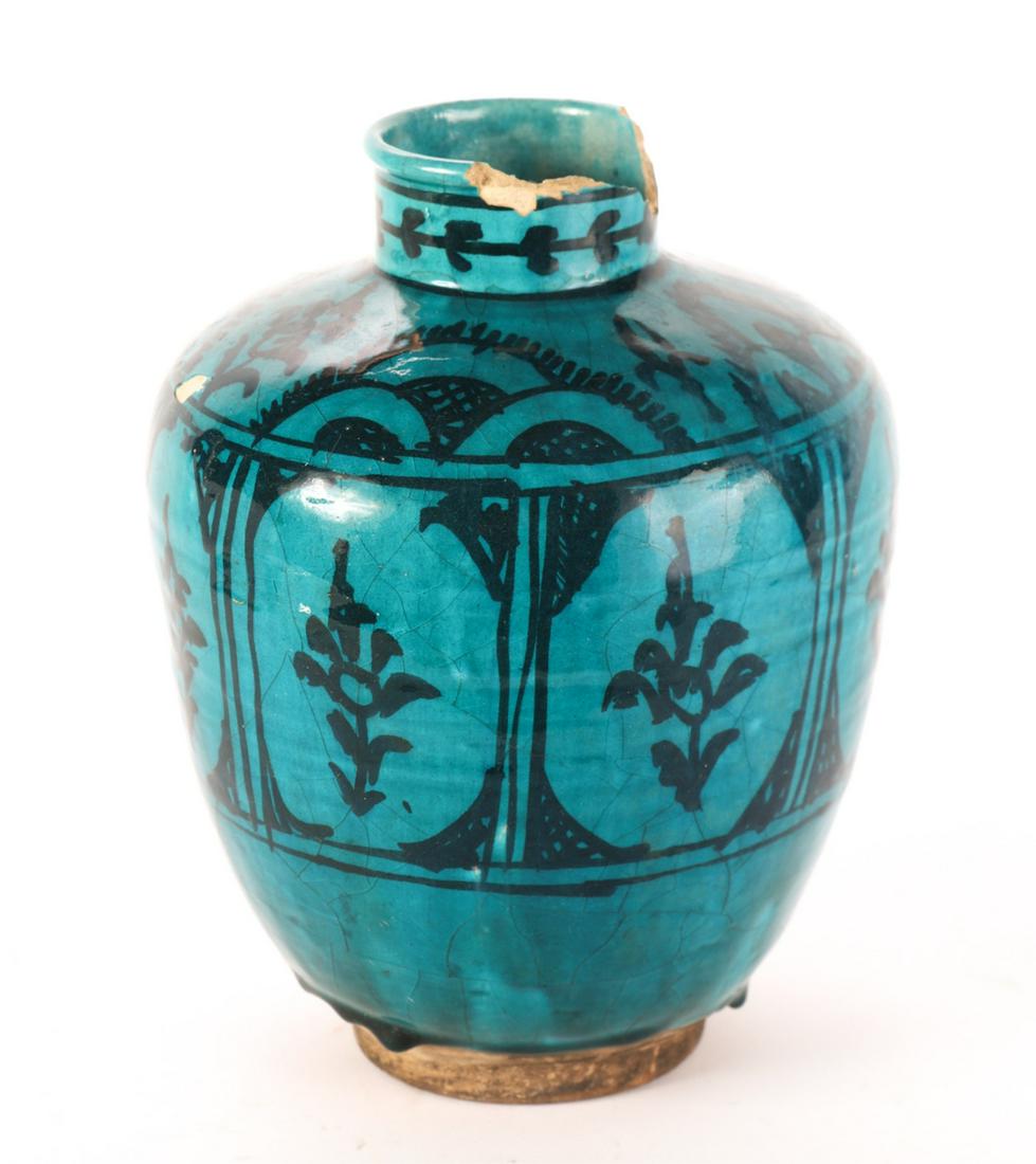 PERSIAN GLAZED EARTHENWARE VASE: Decorated with repeating floral and geometric patterns. 11 1/2 inches