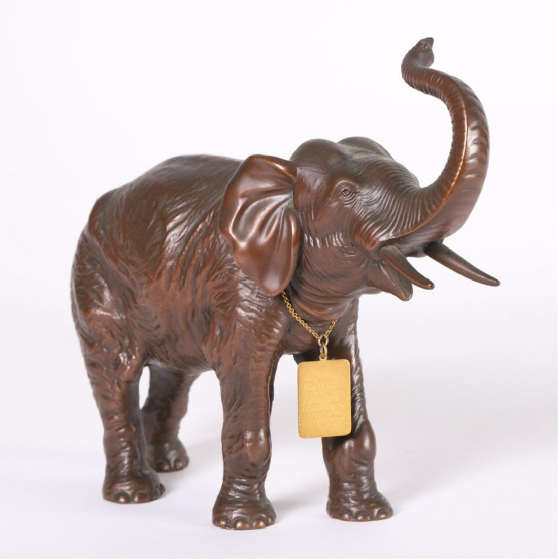 JENNINGS BROTHERS BRONZE ELEPHANT: Draped with a presentation fob "Presented to John J. Hurley by the Young Men's Republican Club Feb. 25, 1941" cast under elephant J.B. 9 x 10 x 3 inches