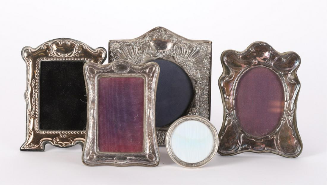 (3) KEYFORD STERLING SILVER FRAMES and (2) OTHERS: Table top frames Footed rectangular and round frames are unmarked. 8 1/2 x 7 inches (and under).