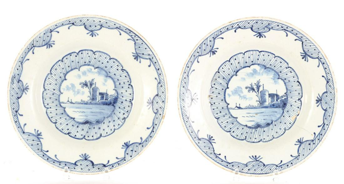 PAIR OF DELFT PLATES: Decorated with romantic landscapes. 9 inches