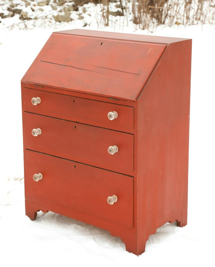 DIMINUTIVE STATE OF MAINE FALL FRONT DESK: In red paint. Writing surface opens to an array of drawers over (3) graduating drawers, shaped apron and bracket feet. 39 1/2 x 30 x 17 3/4 inches