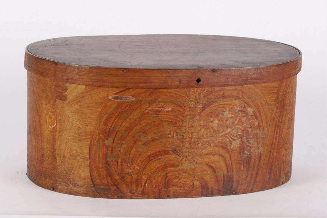 LARGE OVAL PAINT-DECORATED PANTRY BOX: Stenciled sponge decorated ash lap jointed and tack with poplar cover and base. Cover is secured with a finger joint. 9 x 20 x 14 inches