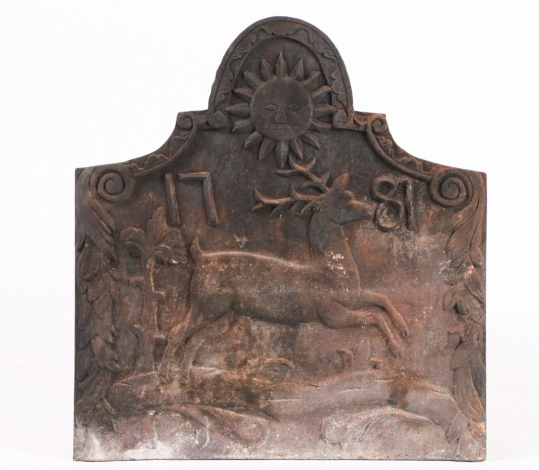 (20th c) CAST IRON FIREBACK DATED 1781: Cast with a stag running beneath the sun. 21 x 20 inches.