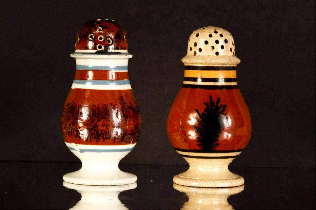 (2) MOCHAWARE SHAKERS: Including: (1) Pearlware shaker with seaweed and (1) Creamware with dendritic motif. 4 inches