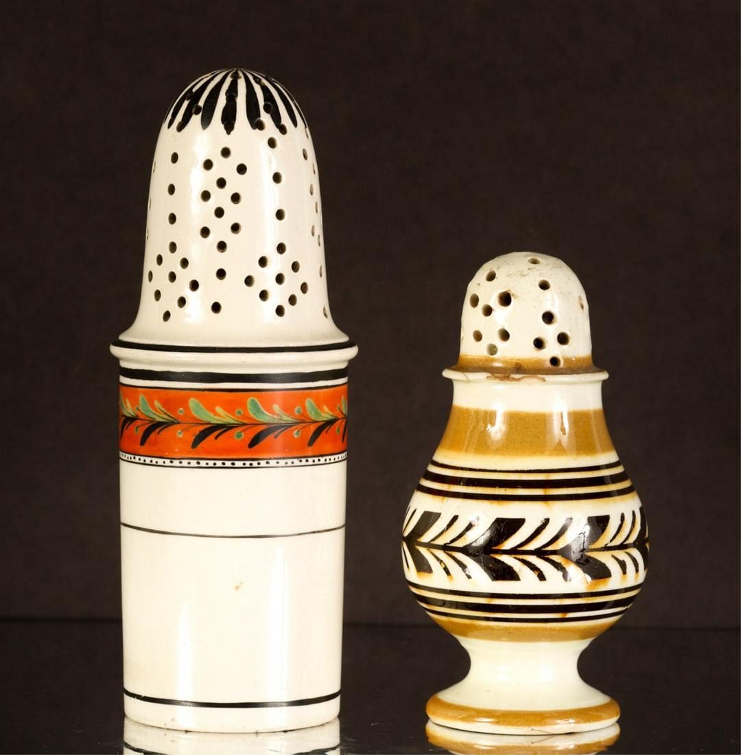 MOCHAWARE PEPPER POT and SHAKER: Pepper pot decorated with apricot band and sprigs, shaker with a floral inspired and mustard bands. 5 1/4 and 3 3/4 inches