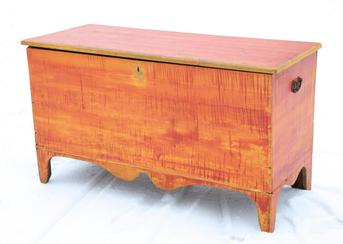 BOLD (19th c) PAINT DECORATED FOLKY BLANKET CHEST: Painted and strap grained in (3) tones of salmon. Molded top opens to single compartment which is raised on shaped apron and bracket feet. 28 1/2" x 49 1/2" x 21"