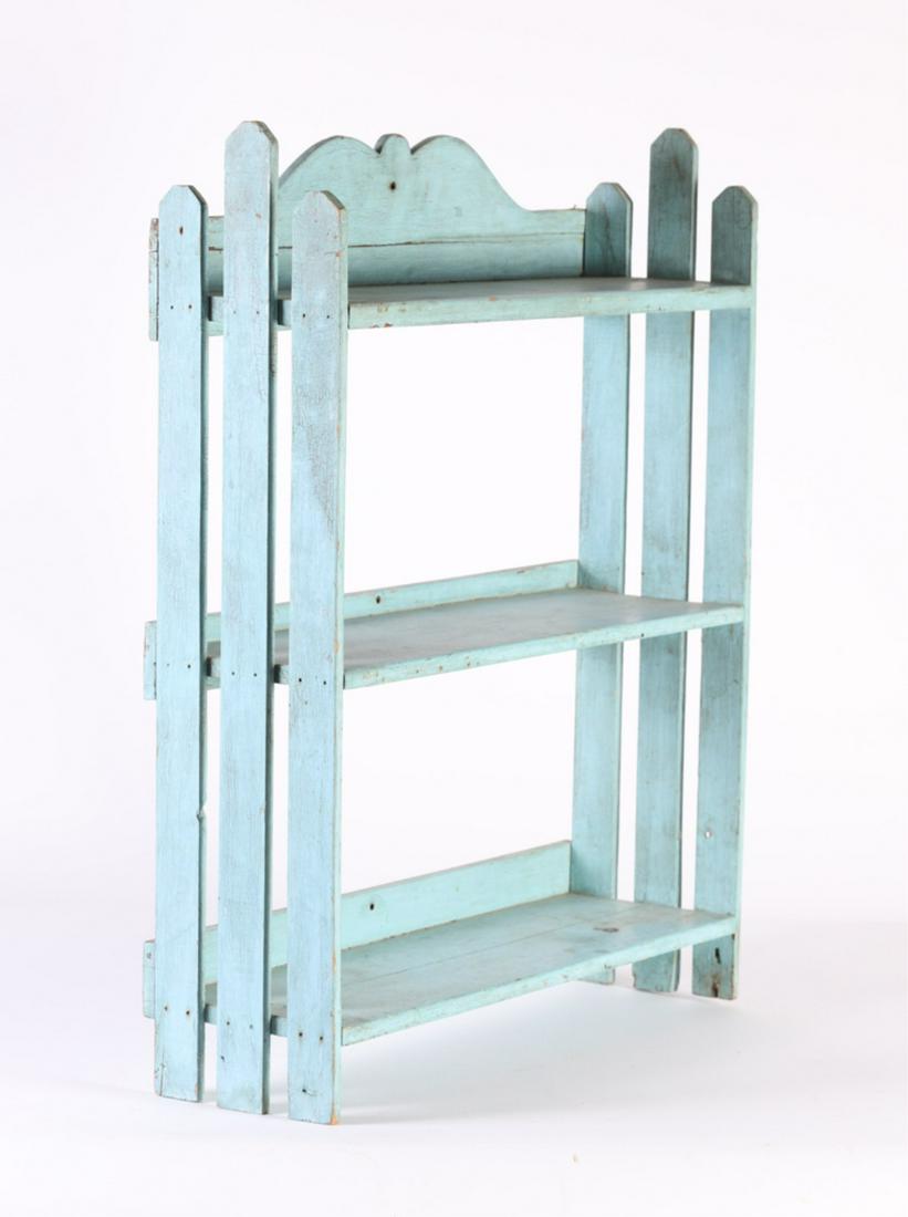 (19th c) WALL SHELF IN ROBIN'S EGG BLUE PAINT: Shaped crest with (3) picket supports. 26 x 21 x 6 inches