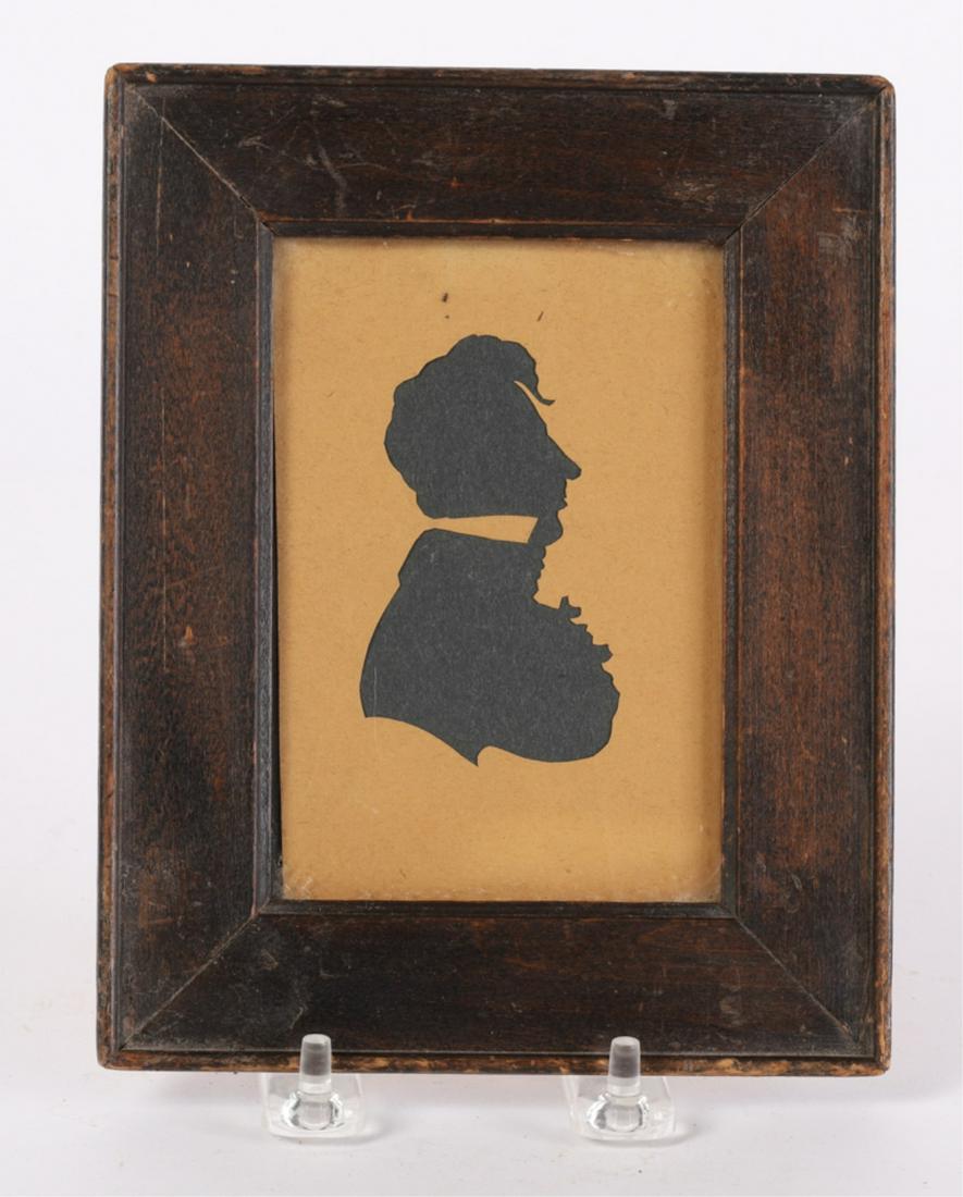 HOLLOWCUT SILHOUETTE of CAPT. MOSES ROGERS: Cut paper with black paper ground. 7 1/4 x 5 3/4 inches (overall including frame)