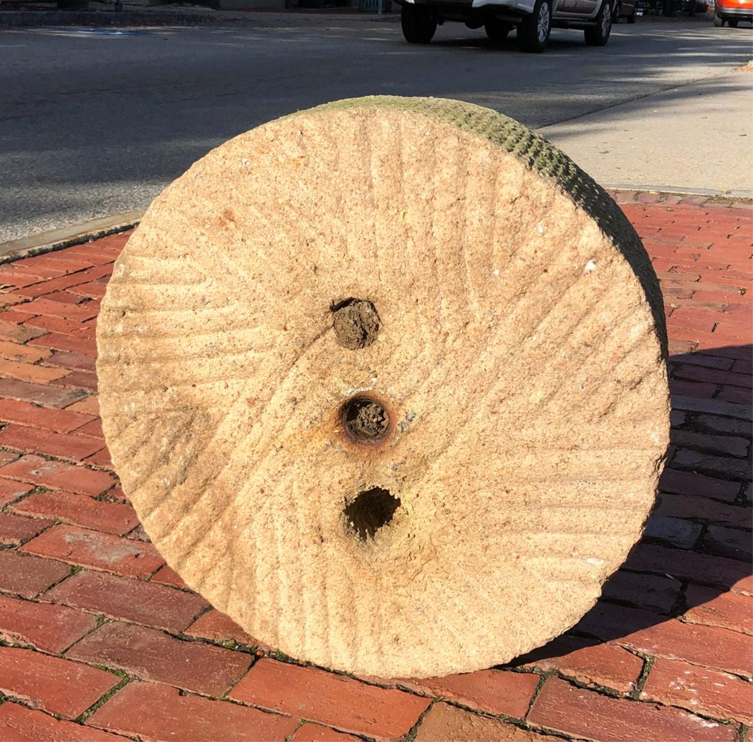 ANTIQUE GRANITE MILLSTONE: 22 x 7 1/2 inches