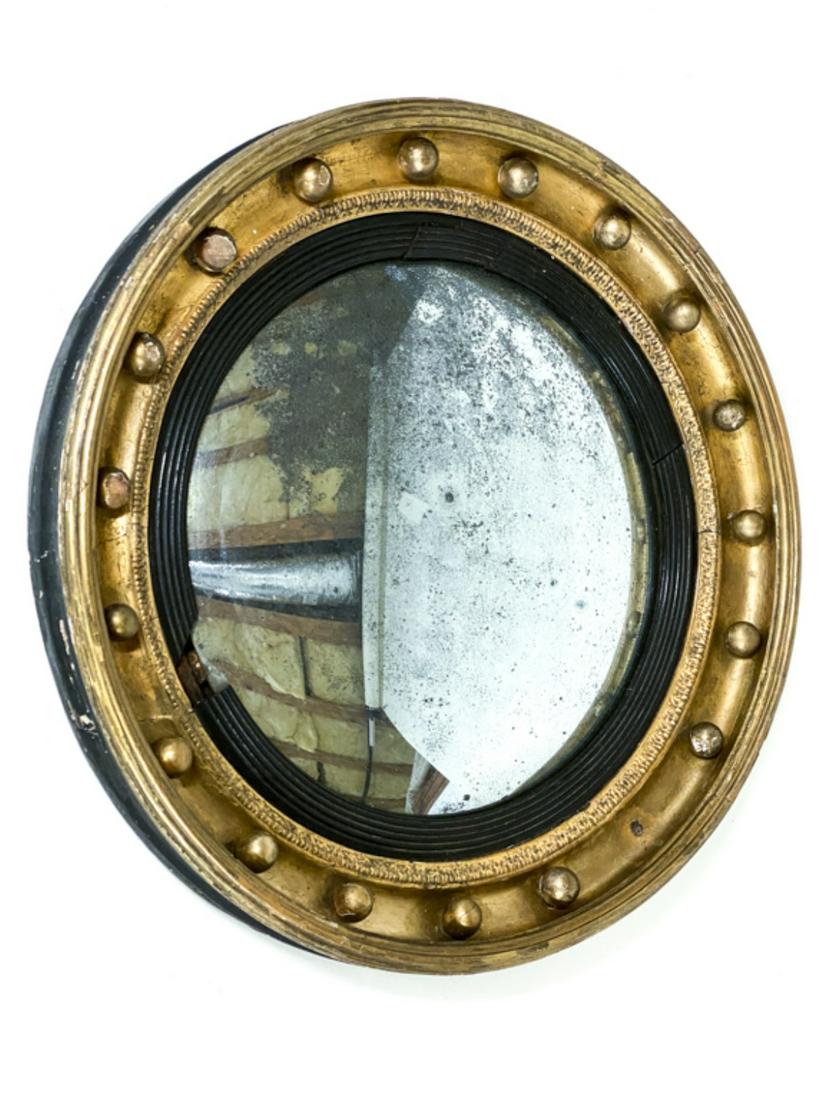 REGENCY GILT WOOD and EBONIZED CONVEX MIRROR: 21 1/2 inches
