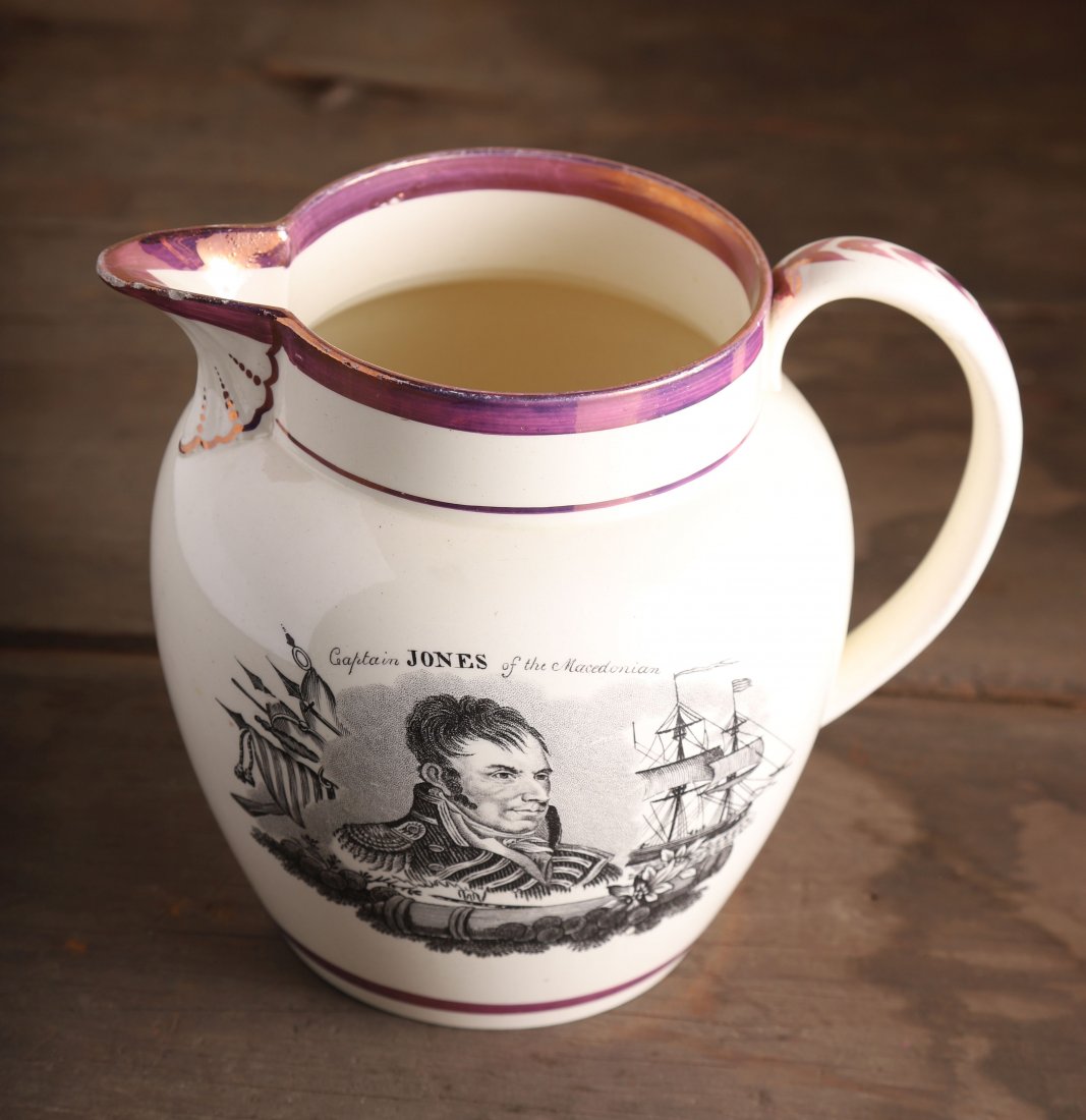 RARE STRAWBERRY LUSTER LIVERPOOL MEMORIAL PITCHER: Transfer decorated creamware with luster bands and images of "Captain Jones of the Macedonian" and "Attack on Fort Oswego" 6 1/4 inches