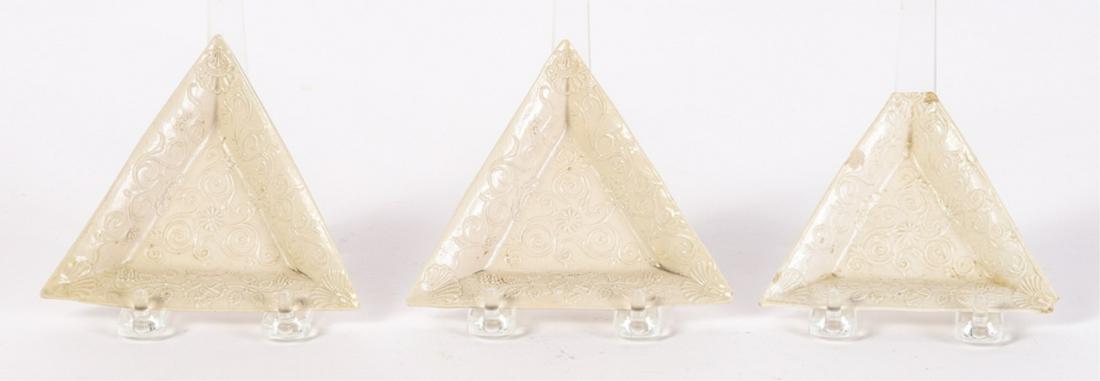 (3) STAFFORDSHIRE SALT-GLAZED TRIANGULAR TRAYS: Embossed with scrolls and grapevine patterns. 4 1/4 x 5 inches