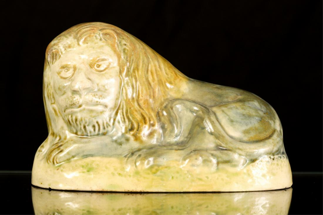 (18th / 19th c) ENGLISH CREAMWARE LION: 2 1/4 x 4 1/2 x 2 1/4 inches