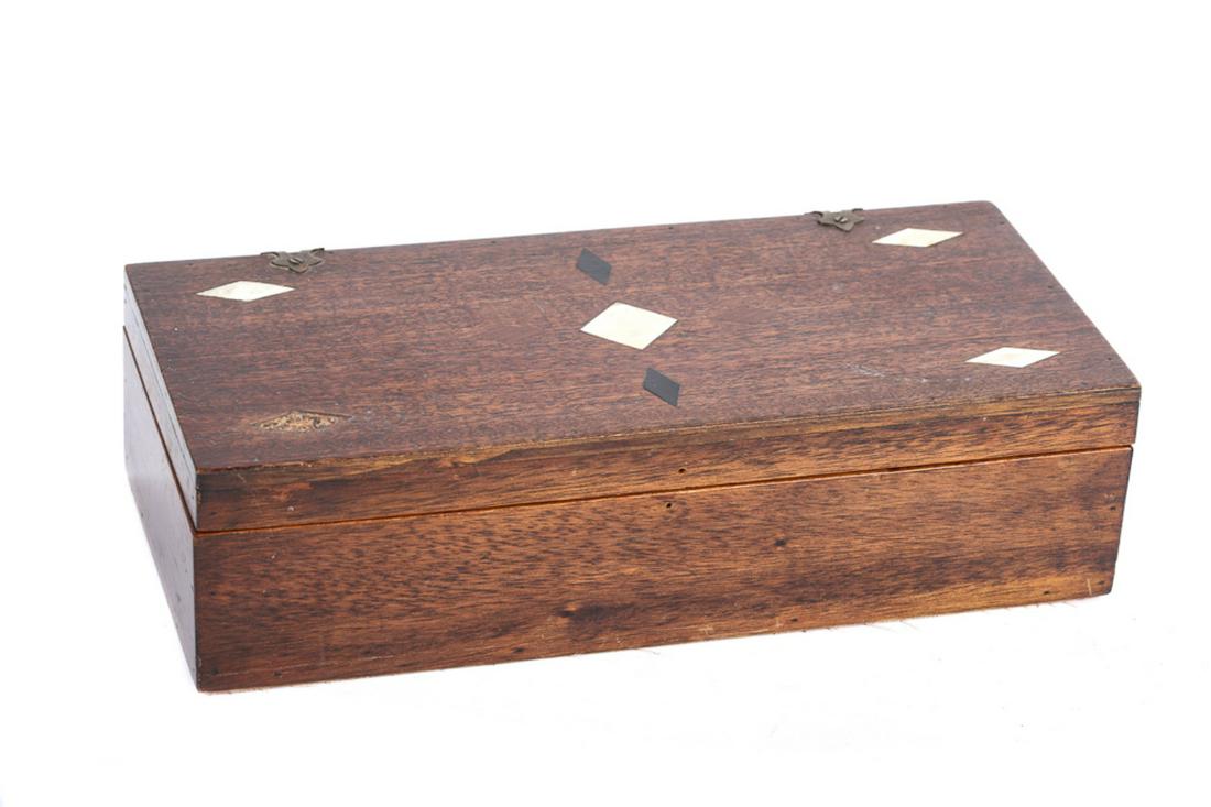 SAILOR MADE DITTY BOX WITH INLAYS: BOX. Sailor made box with various inlays of wood and bone. 9 3/4" X 5 1/2" X 3 ". A very good useful scrimshaw box