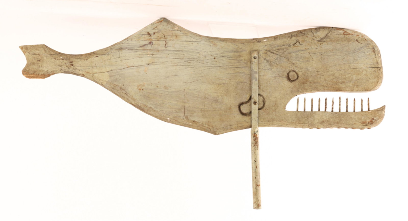 CARVED AND PAINTED WOOD SPERM WHALE WEATHERVANE: (First half 20th c) Cut from a single piece of pine with nail teeth. 17 x 30 x 3/4 inches