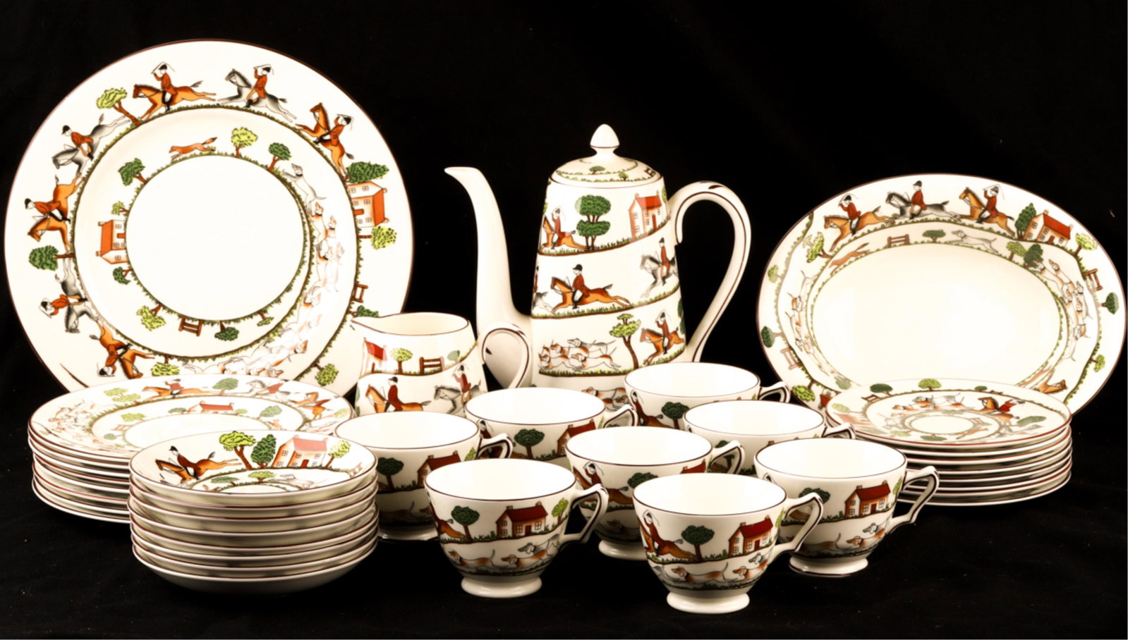 CROWN STAFFORDSHIRE BONE CHINA "HUNTING SCENE": An assortment of plates, (8) Cups and saucers, tray and teapot. 7 1/2 inches (teapot)