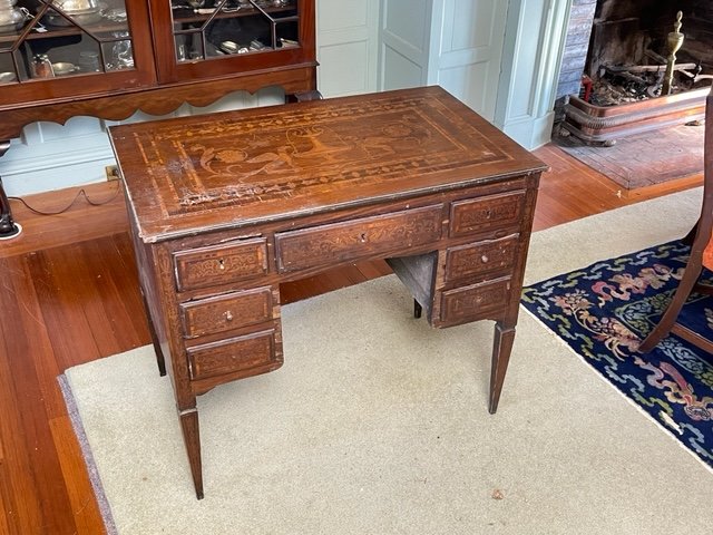 ITALIAN-CONTINENTAL MARQUETRY INLAID LADY'S DESK: Inlaid on (5) sides with griffins, vases, acanthus leaves, florets and scrolls. Front of desk mimics writing side with faux drawers. 31 x 36 x 22 inches. N.B. Late addition to the sale having just bee