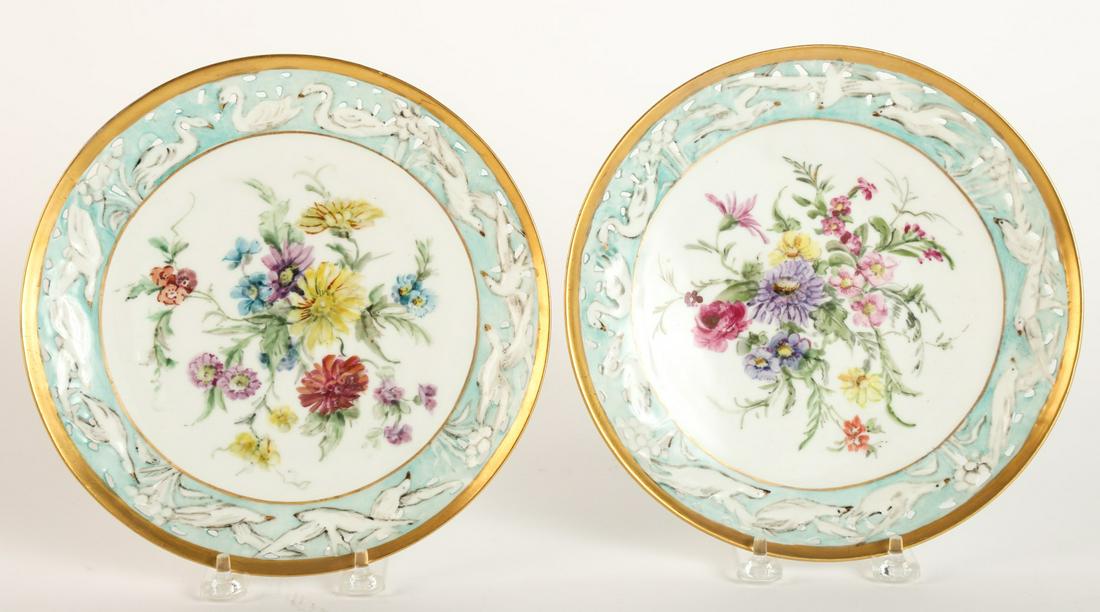 PAIR OF HAND PAINTED MORITZ ZDEKAUER CHINA PLATES: Piece rims painted with swans with floral centers. signed 8 3/4 inches Condition: Good