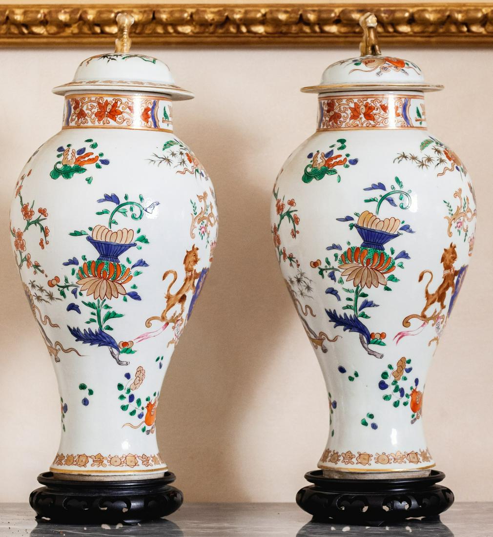 PAIR of EARL OF CANARVON ARMORIAL PORCELAIN URNS: Henry John George Herbert, 3rd Earl (1800-1840). 15 inches to top of guardian dog finials. Condition: GoodTemp No 18