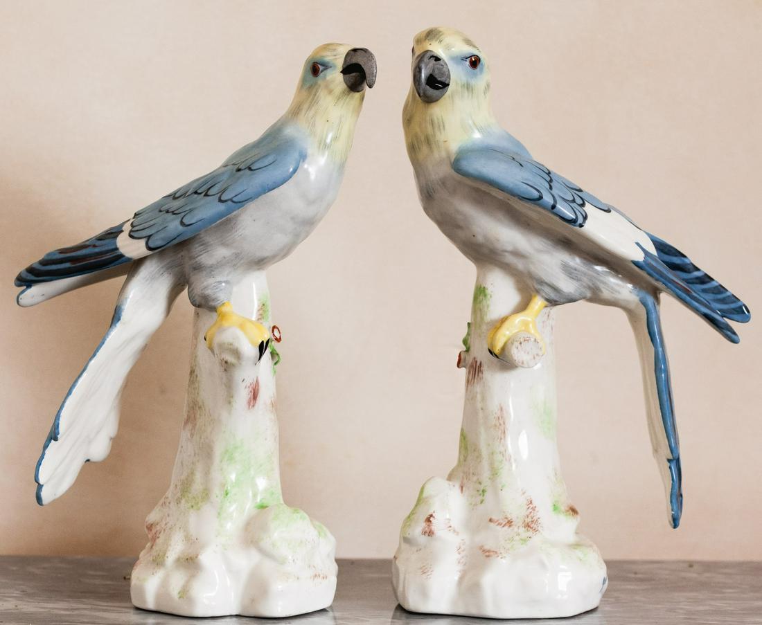 PAIR OF PARIS PORCELAIN PARROTS: Each in slightly different poses. 8 1/2 inches. signed and labeled Condition: GoodTemp No 40