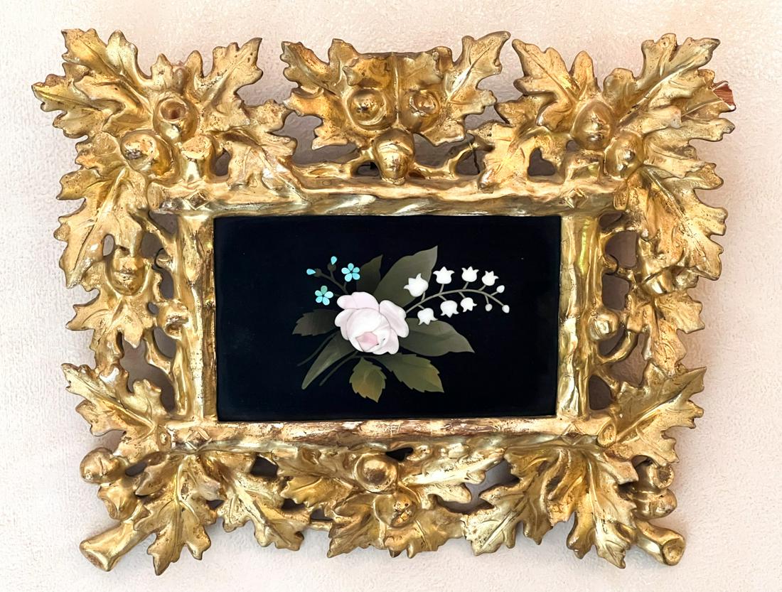 (19th c) ITALIAN HARDSTONE PIETRA DURA PLAQUE: "Rose and Lily of the Valley" 3 x 4 1/2 inches. Presented in a carved and gilt Florentine frame. 7 x 9 inches (overall) Condition: GoodTemp No 103