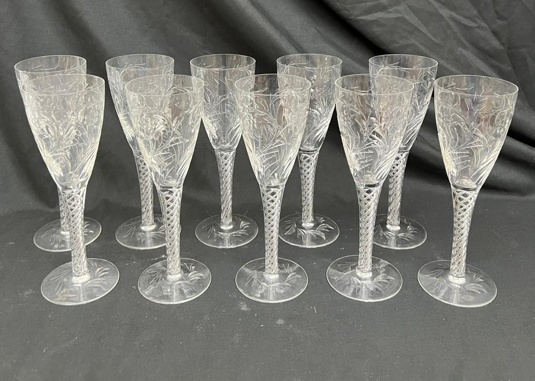 (10) STUART ENGLAND "ARIEL" RED WINE GLASSES: Fonts engraved with floral motifs and air twist stems. 7 1/2 inchesTemp No 149