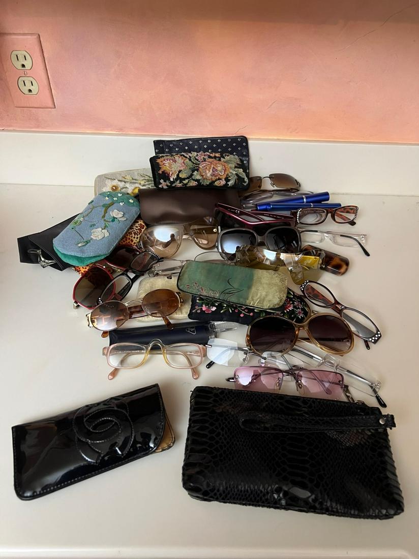 GROUPING OF SUN and EYE GLASSES with CASES: Including : Chanel and a vanity purseTemp No 496