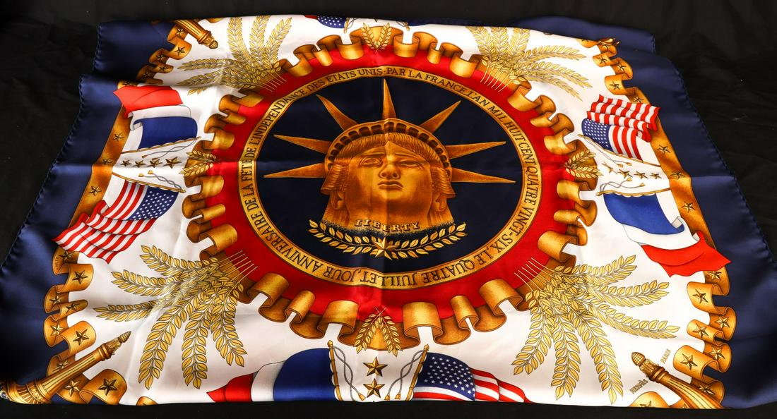 HERMES PARIS SILK SCARF: Commemorating the centennial of France's gift of the Statue of Liberty 35 x 35 inches. Together with its original Hermes boxes and pamphlet on how to wear your Hermes scarf. Condition: Good, cleanTemp