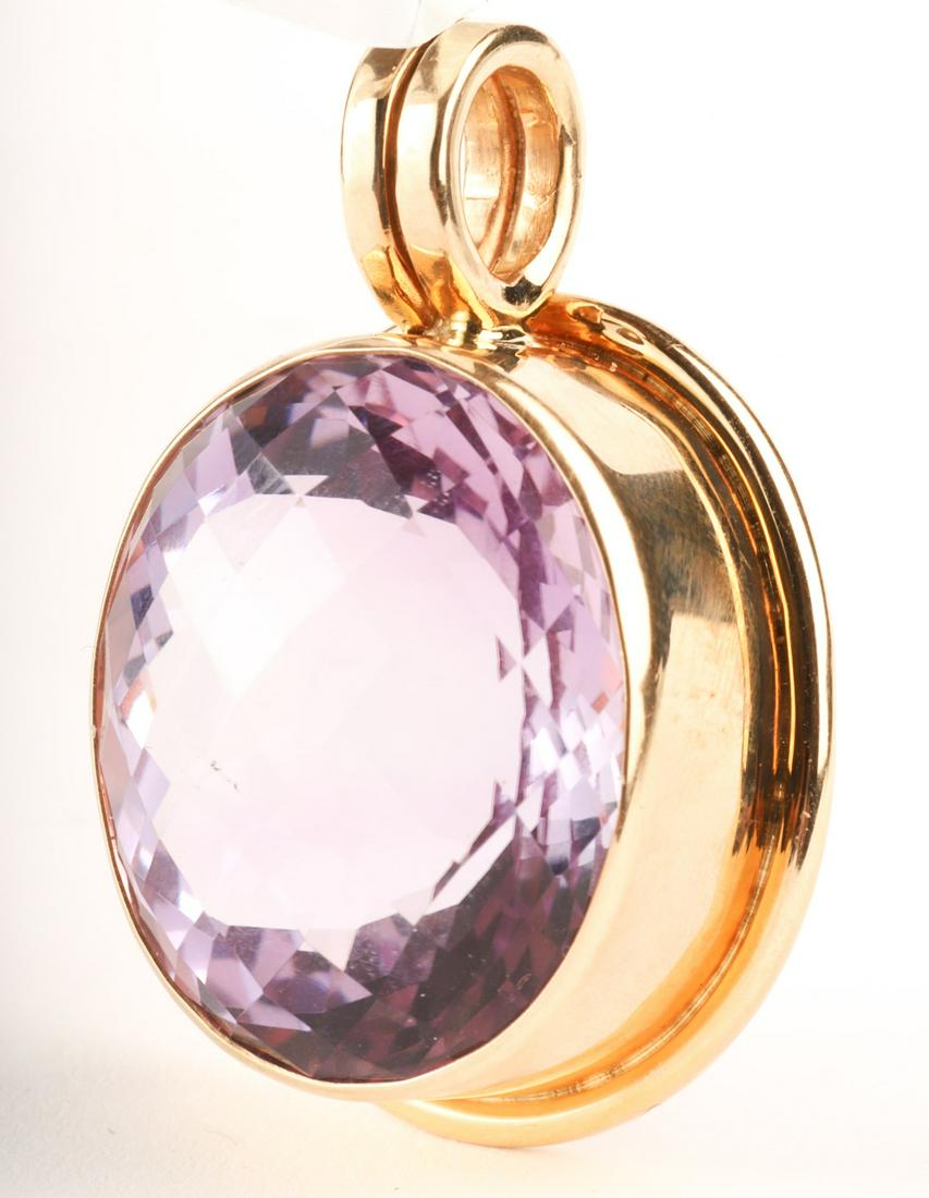 BAKSA 14k GOLD OVAL PINEAPPLE-CUT AMETHYST PENDANT: Lavender-colored amethyst 37.30 ct. 1 inch (not including bail) Condition: GoodTemp No 44-9044