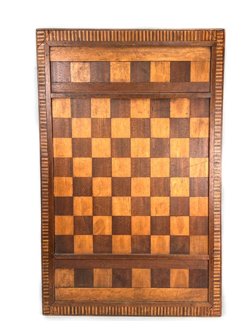 DOUBLESIDED GAME BOARD:OLD PAINT & INLAID SURFACES: (1) Side in nice old blue paint and the other in alternating birch and walnut patterns. 29 7/8 x 18 7/8 inches. Condition: Good.