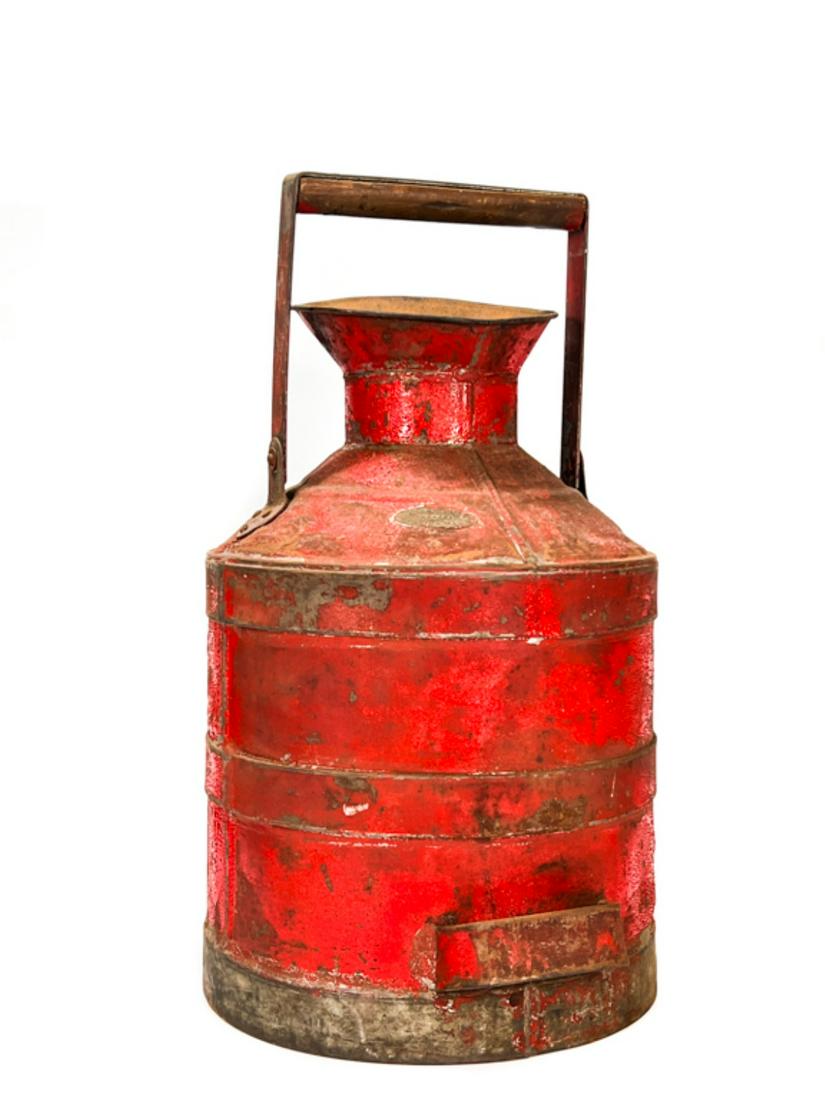 RED PAINTED 5 GAL "SEXTON CAN COMPANY" OF BOSTON: Wooden swing handle with secondary stabilizing handle for pouring. With attached medallion. 20 inch height. Original red paint. Condition: Wear to paint. Some oxidation.
