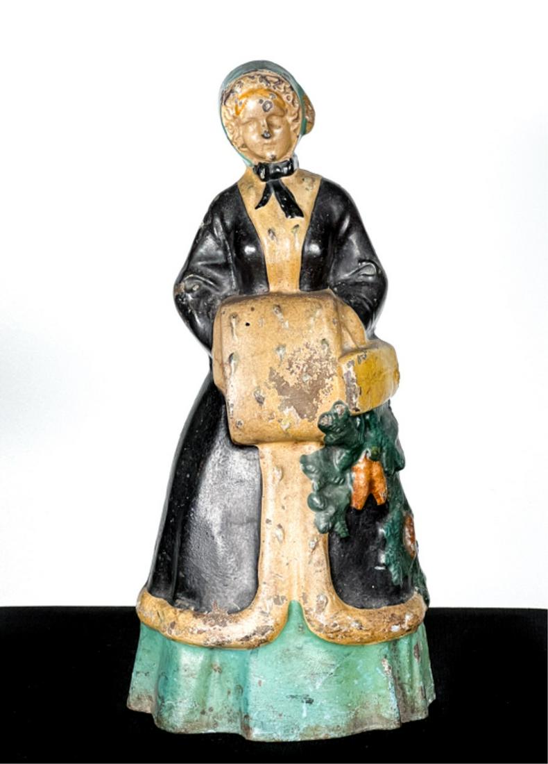 PAINTED CAST IRON DOORSTOP OF A WOMAN (1 of 6)