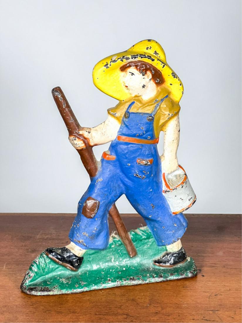 PAINTED CAST IRON "HUCKLEBERRY FINN" DOORSTOP (1 of 4)