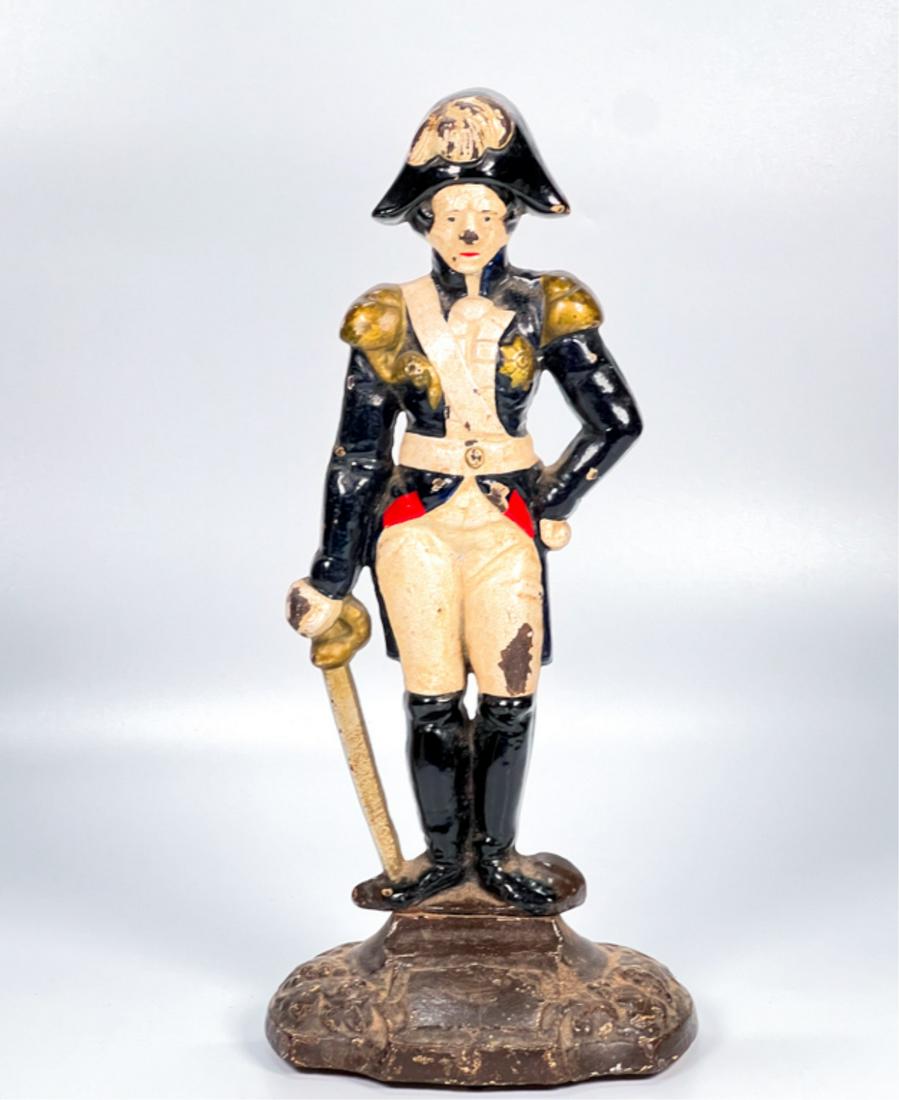 PAINTED CAST IRON "ADMIRAL NELSON" DOORSTOP: 13 7/8 inches. Condition: Some loss to paint.