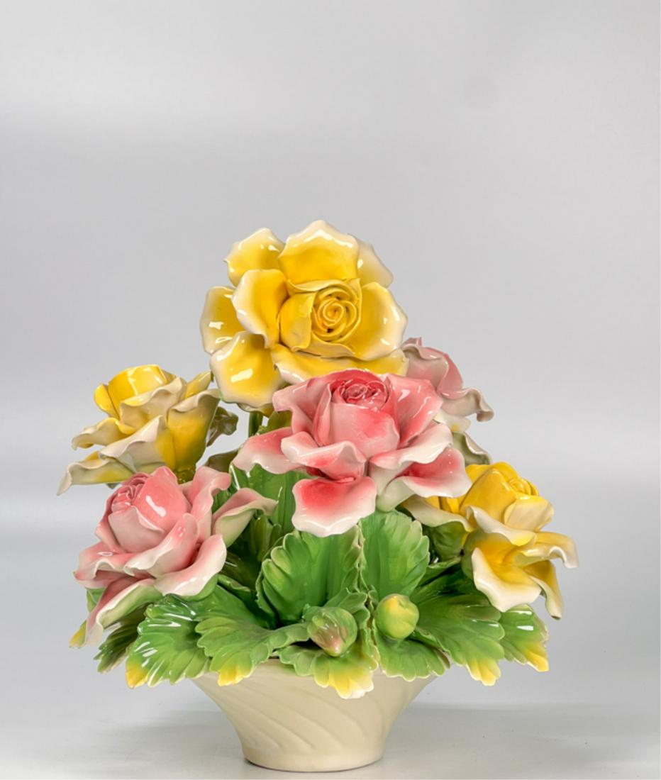 HAND PAINTED ITALIAN ROSES PORCELAIN GROUPING: Pink and yellow roses in vase. 10 1/2 inch height. Condition: Some minor and sporadic chips to edges. See photos. Overall good.
