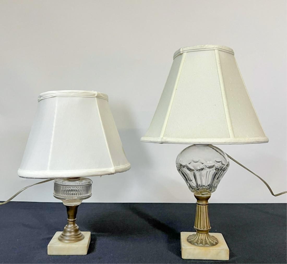 (2) 19th C OIL LAMPS w MARBLE BASES, ELECTRIFIED: (1) Sandwich glass style Whale oil lamp. Tallest measures 19 inches. Condition: Good. Expected wear.
