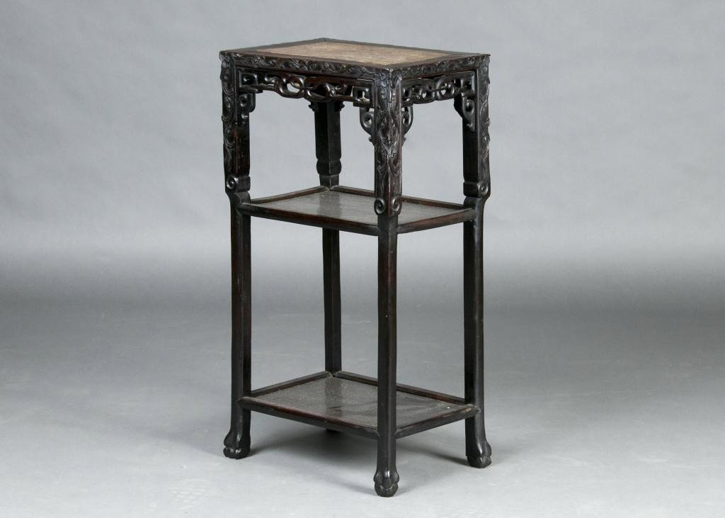Early 20th c. Chinese Hardwood two tier stand: with Inset Marble top, and pierced carvings H: 32 X W: 16 1/2 X D: 11 1/2