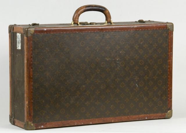 Vintage Louis Vuitton Suitcase: Stamped on neck and #791990 in the interior, 24"w x 17 1/2"h x 7 1/2"d