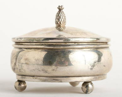 ROUND CARTIER FOOTED STERLING SILVER JEWELRY BOX: with Pineapple Finial Approx. 2 1/2" x 3". 2.79 ozt overall including padding Condition: Ref photos or call for more info Temp No 5010