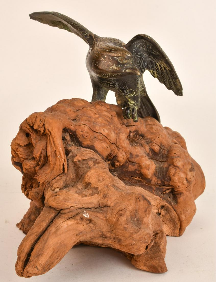 (19th / 20th c) JAPANESE BRASS EAGLE: Perching on a burl wood base. 6 x 8 x 5 inches Condition: Good Temp No 6573