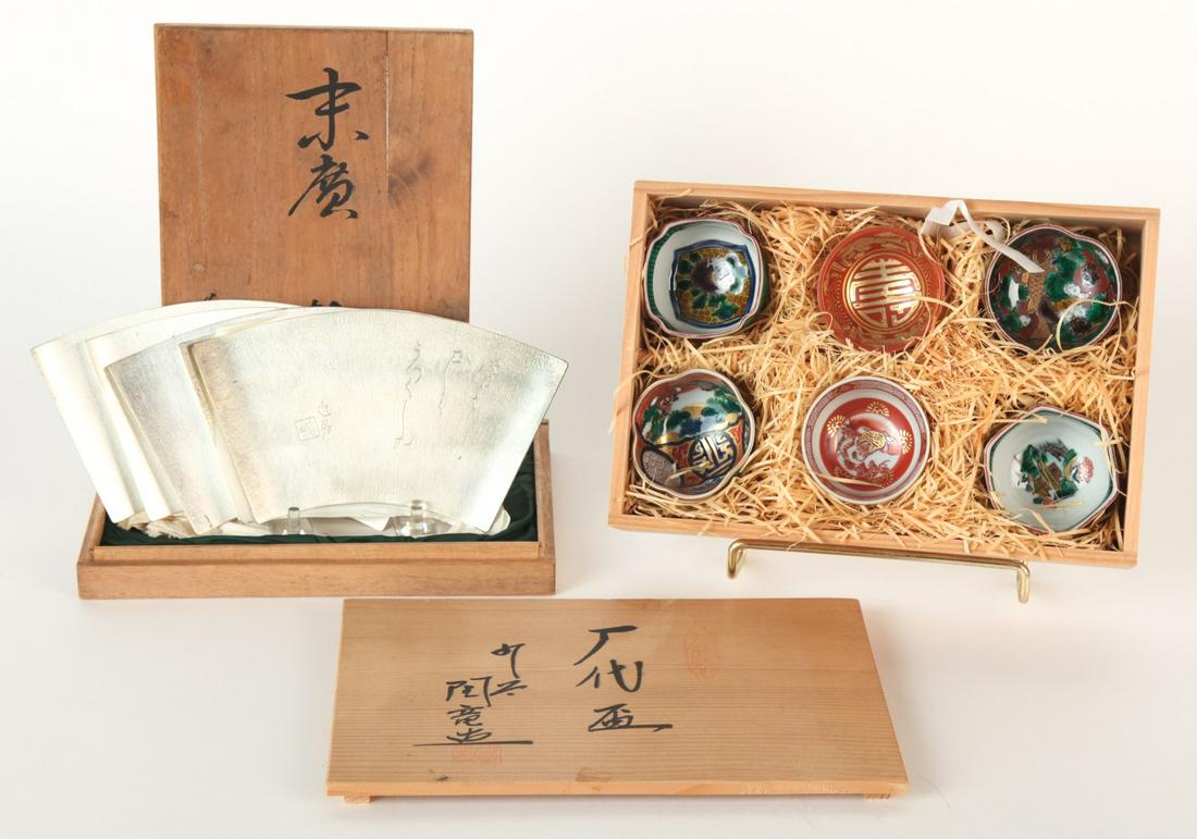 JAPANESE STERLING PRESENTATION GIFT TO A. BURRIDGE: Set of (5) fan-form trays and (6) porcelain teacups. Presented with their original signed boxes. 6 x 9 inches Condition: Good Temp No 6113