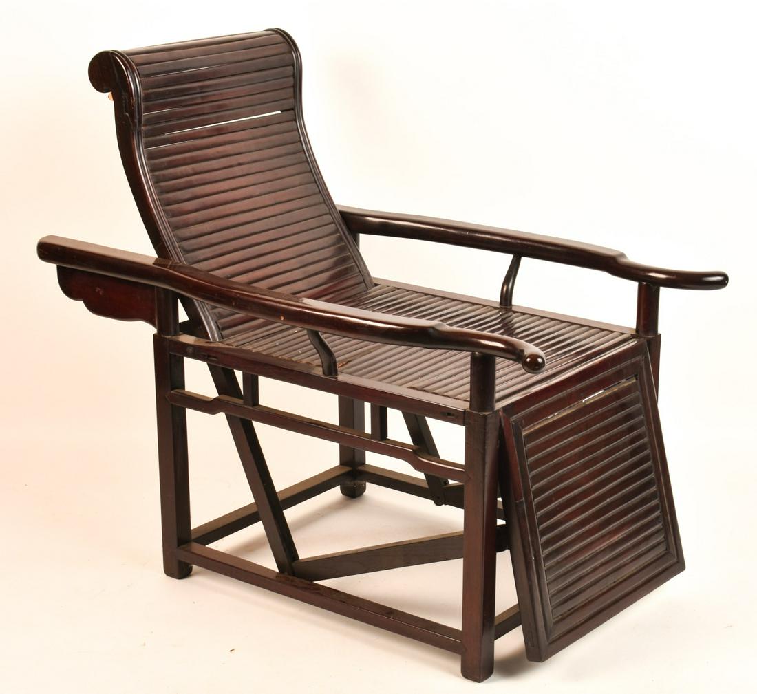 PAIR OF (19th c) CHINA TRADE HARDWOOD RECLINERS: As backs reclines leg rest hinges upward. 37 1/2 x 42 x 26 inches (with seat up) Condition: Small non-displaced break to (1) seat Temp No 6465