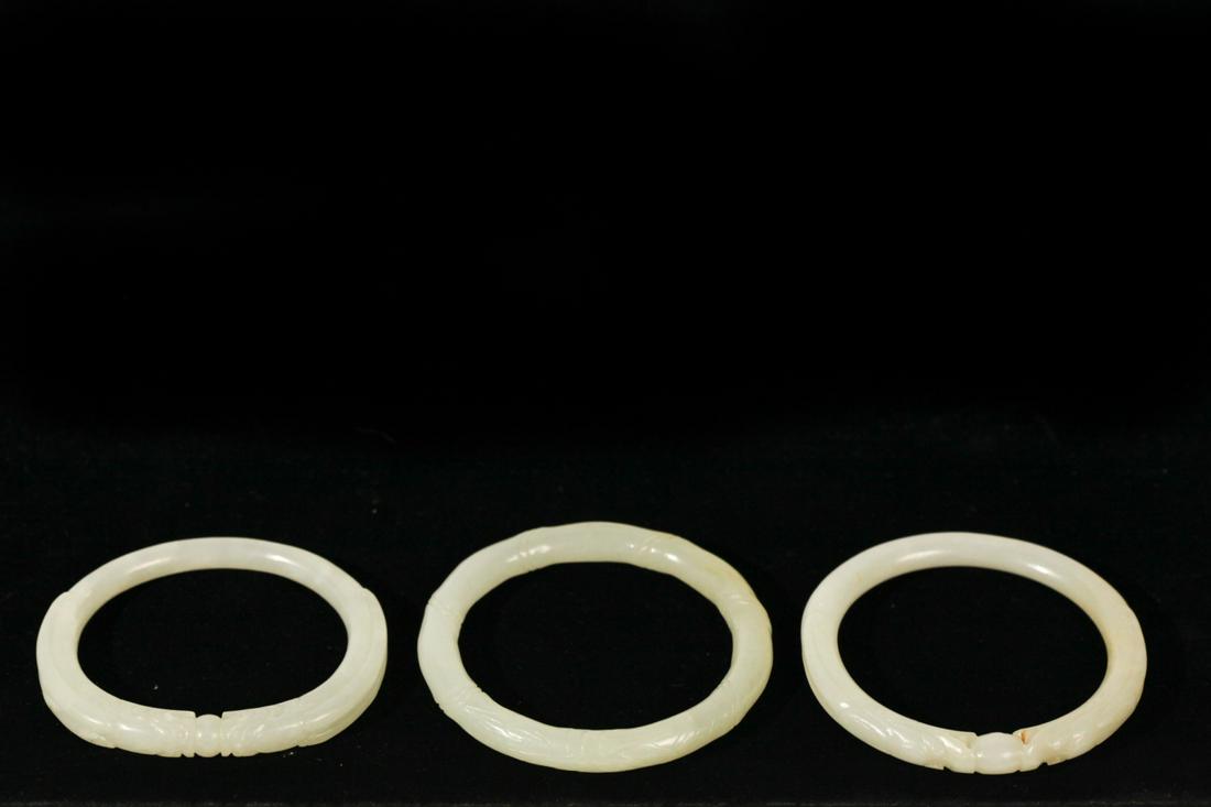 GROUP (3) FINELY CARVED WHITE JADE HOOPS (1 of 15)