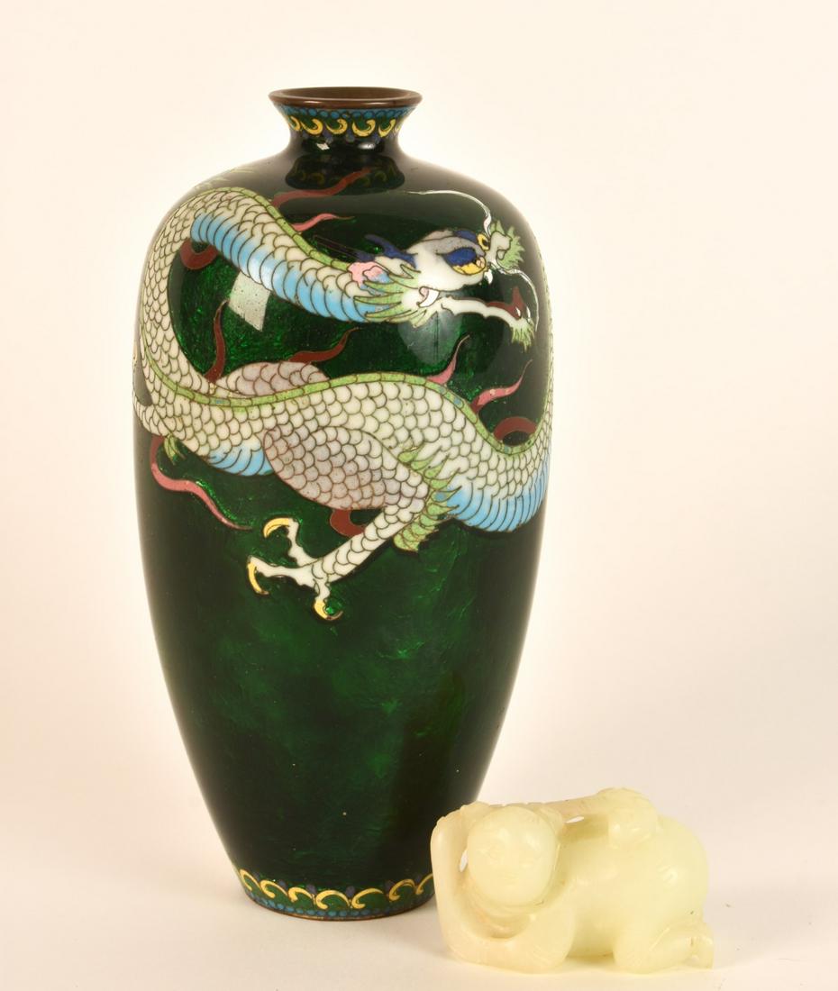 FOIL BACKED CLOISONNE VASE and EROTIC CARVING: 7 1/ 2 inches. Together with a jade carving of a animated figure scratching his back. 2 1/2 inches Condition: Loss to foot Temp No 6632